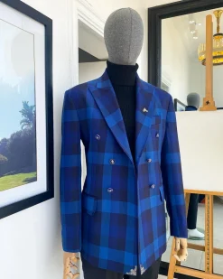 A multicolor shade of blue windowpane check double breasted Peak lapel suit