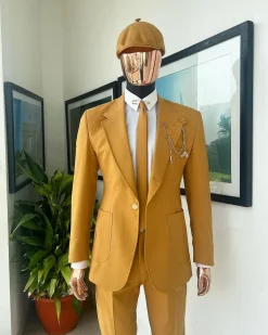 A Mustard Yellow Linen Jacket, Slim Cut Tie, Gurkha Pant Trousers, And Hat