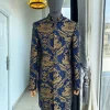 A “Namaste” Indian Sherwani Traditional Wedding Safari Gold Pattern Suit