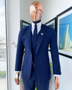 A navy blue – layered square patterned – Jorgecarli super 140’s- “Board Room” notch lapel suit