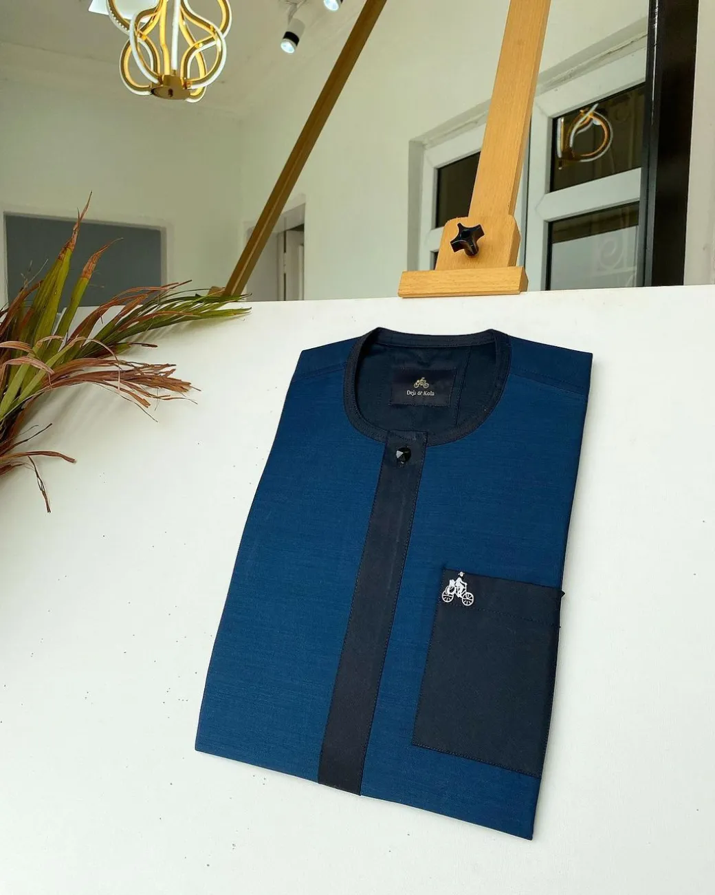A Navy blue and blue flap African kaftan with matching patch pocket and Sokoto