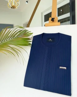 A Navy blue and red pinstripe African kaftan with an adjacent lane design and Sokoto