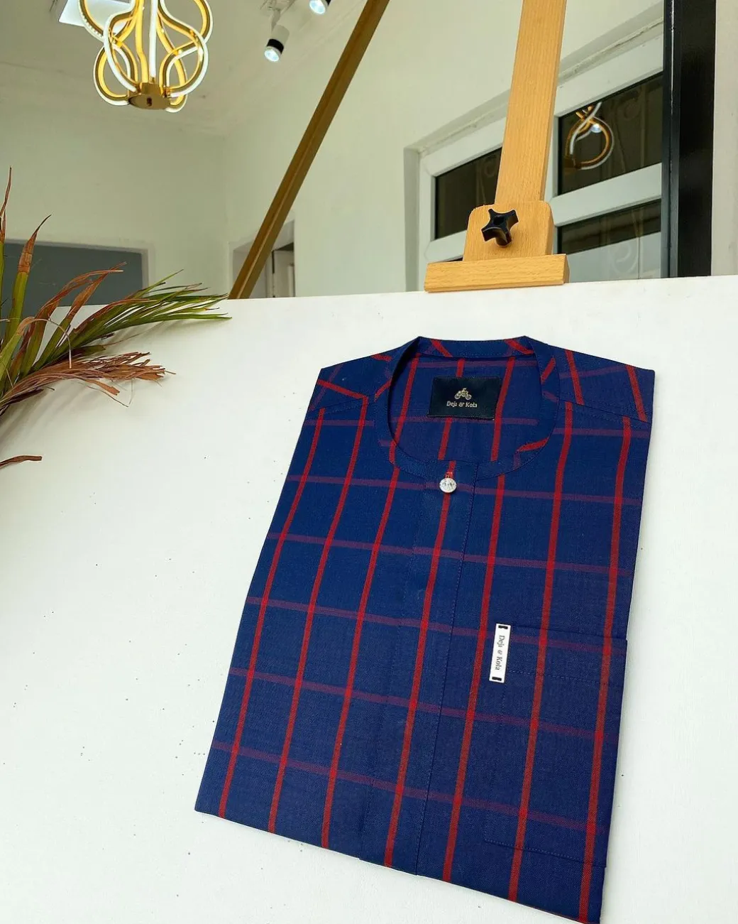 A Navy blue and red windowpane check traditional African kaftan and Sokoto