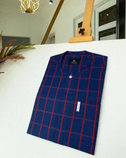 A Navy blue and red windowpane check traditional African kaftan and Sokoto