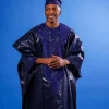 A Navy blue “Arewa” embroidery front cut towards back, traditional Agbada, 3/4 sleeve kaftan, and Sokoto