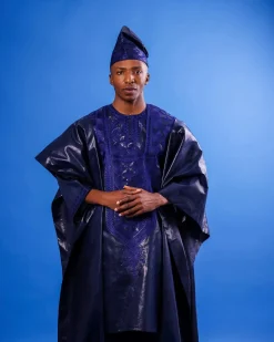 A Navy blue “Arewa” embroidery front cut towards back, traditional Agbada, 3/4 sleeve kaftan, and Sokoto
