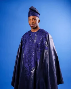 A Navy blue “Arewa” embroidery front cut towards back, traditional Agbada, 3/4 sleeve kaftan, and Sokoto
