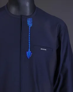 A Navy blue arrow and tiger head embroidery detail with matching Swarovski stone kaftan and Sokoto