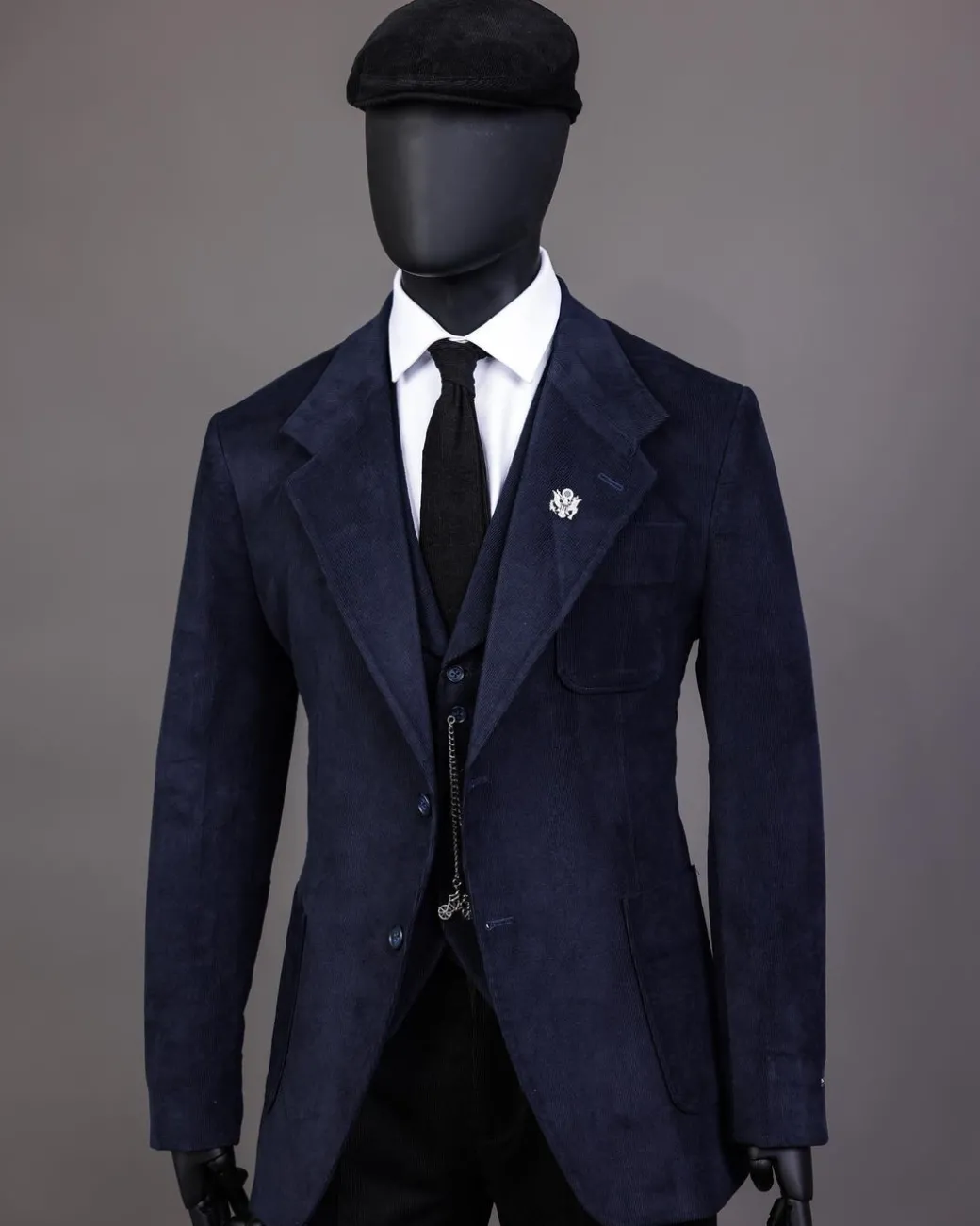 A Navy Blue Corduroy, notch lapel, patch pocket 2 button suit