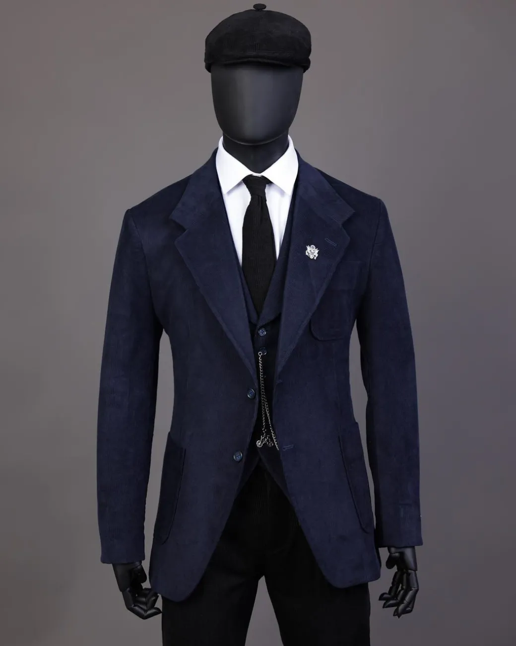 A Navy Blue Corduroy, notch lapel, patch pocket 2 button suit