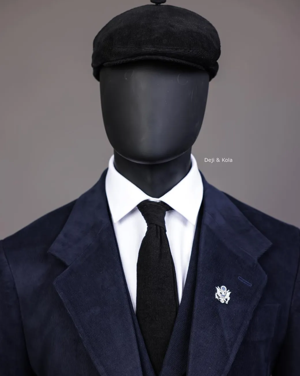 A Navy Blue Corduroy, notch lapel, patch pocket 2 button suit