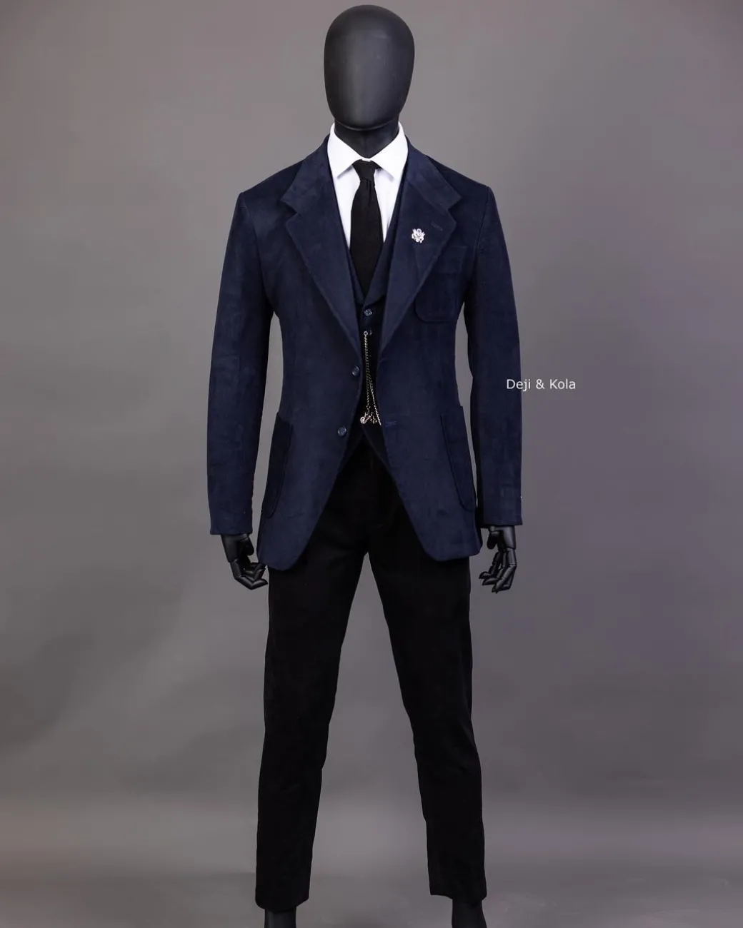 A Navy Blue Corduroy, notch lapel, patch pocket 2 button suit