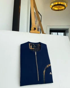 A Navy blue, curved rainbow pocket, gold zip line detailing African traditional senator kaftan