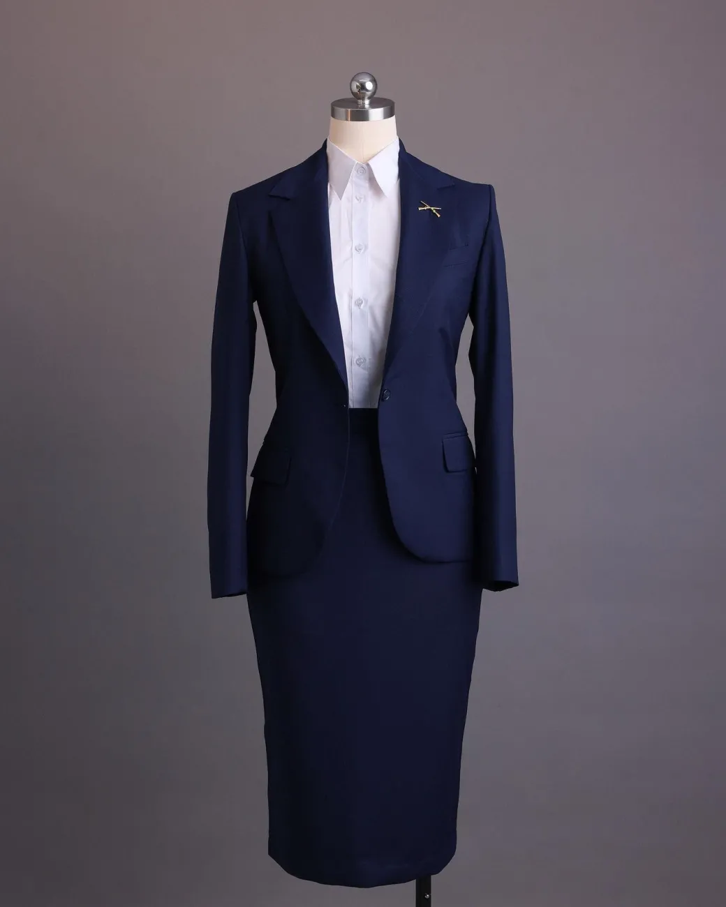 A Navy Blue, dotted pattern, nobility wool blend, business-wide notch lapel suit