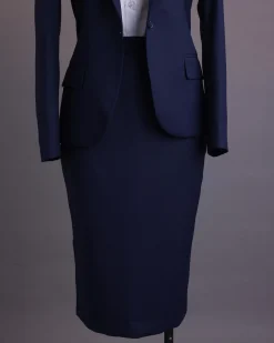 A Navy Blue, dotted pattern, nobility wool blend, business-wide notch lapel suit