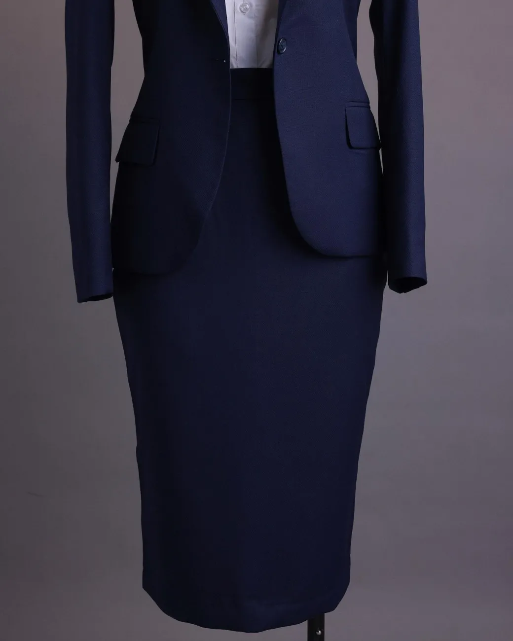 A Navy Blue, dotted pattern, nobility wool blend, business-wide notch lapel suit