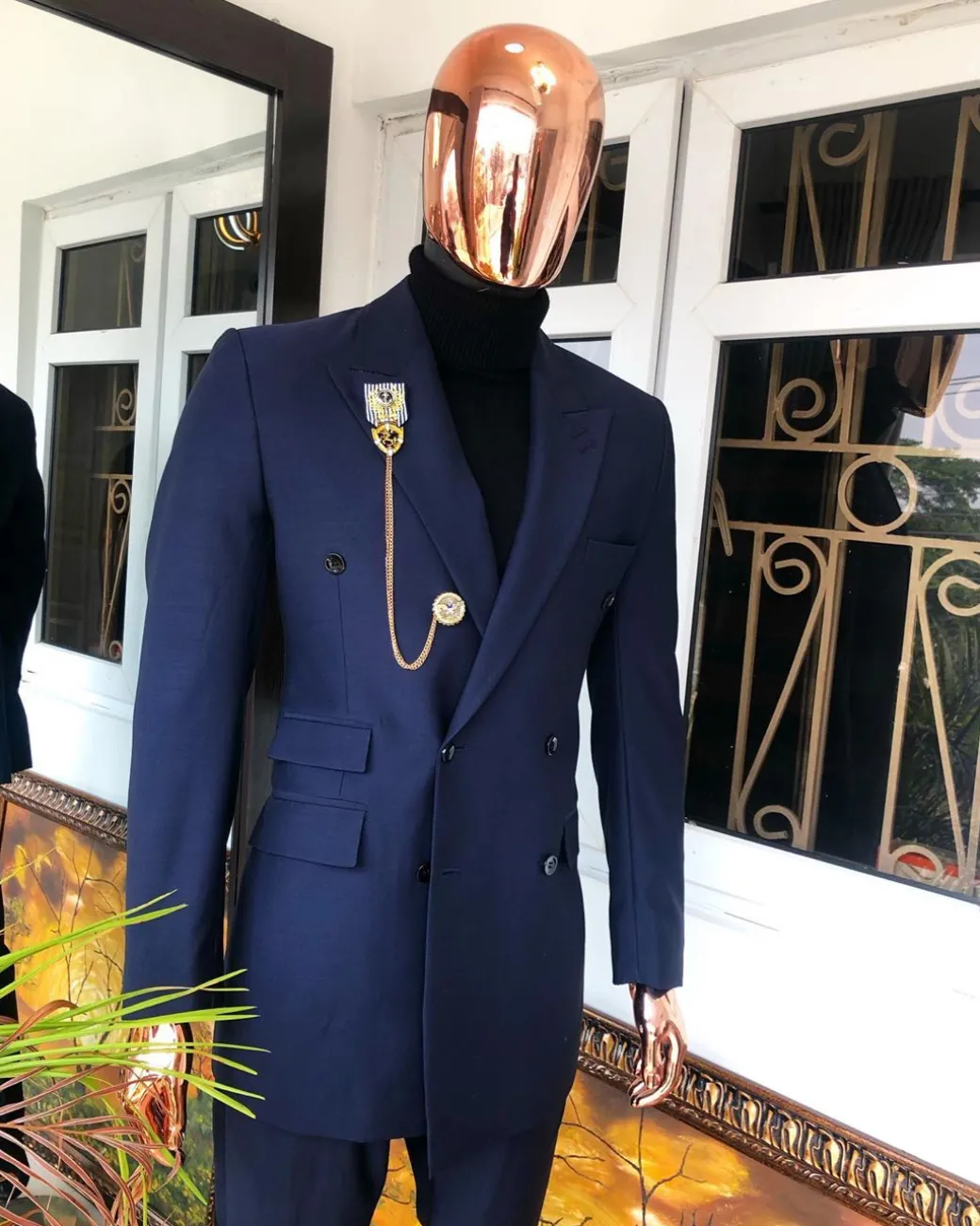 A Navy Blue Double Breasted corporate Peak lapel suit