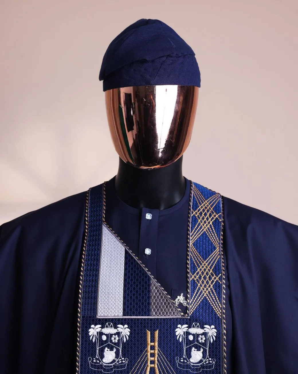 A Navy blue, “Eko Baje Ti – Lagos Will Never Spoil” embroidery details Agbada.