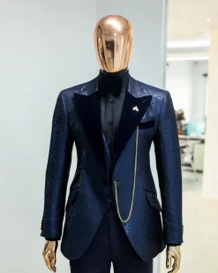 A Navy blue, floral pattern jacquard, peak lapel tuxedo suit