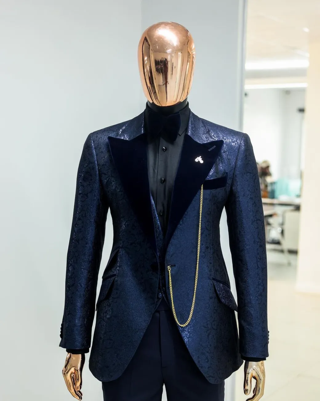 A Navy blue, floral pattern jacquard, peak lapel tuxedo suit