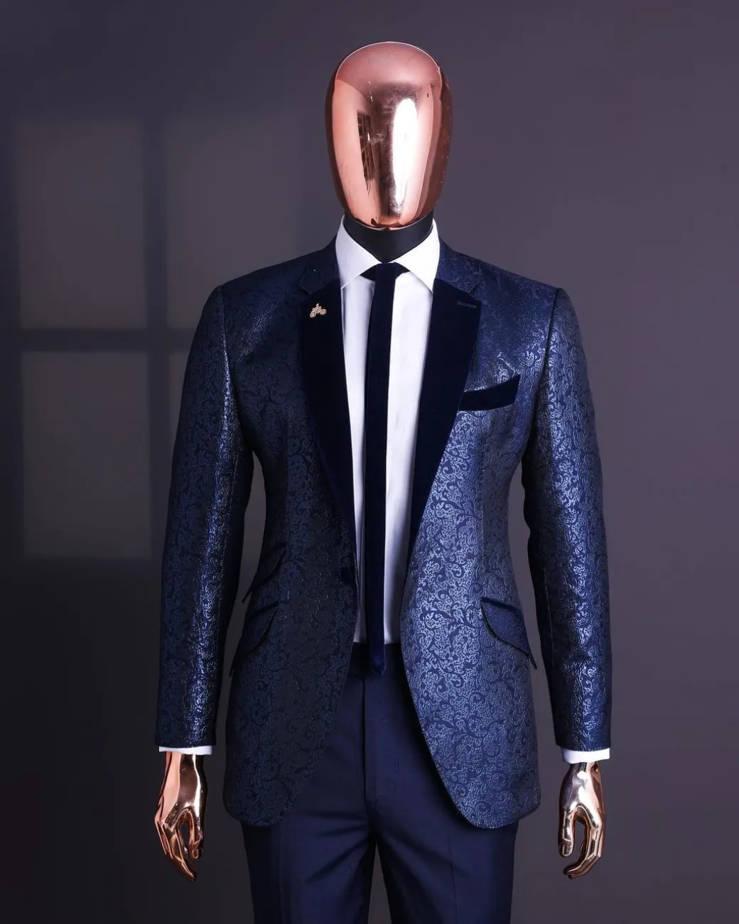 A Navy blue, floral pattern jacquard, slim notch lapel tuxedo suit