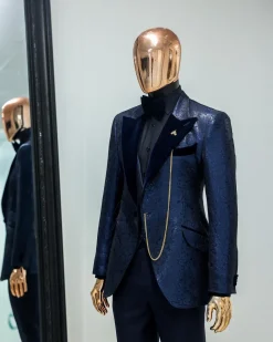 A Navy blue, floral pattern jacquard, peak lapel tuxedo suit