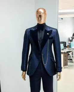 A Navy blue, floral pattern jacquard, peak lapel tuxedo suit