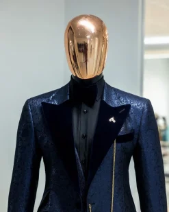 A Navy blue, floral pattern jacquard, peak lapel tuxedo suit