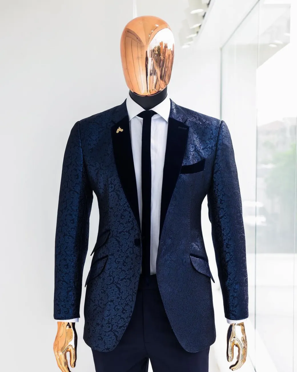 A Navy blue, floral pattern jacquard, slim notch lapel tuxedo suit