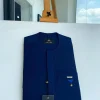 A Navy blue, front flap and slant pocket with inverted tree detailing senator kaftan native.
