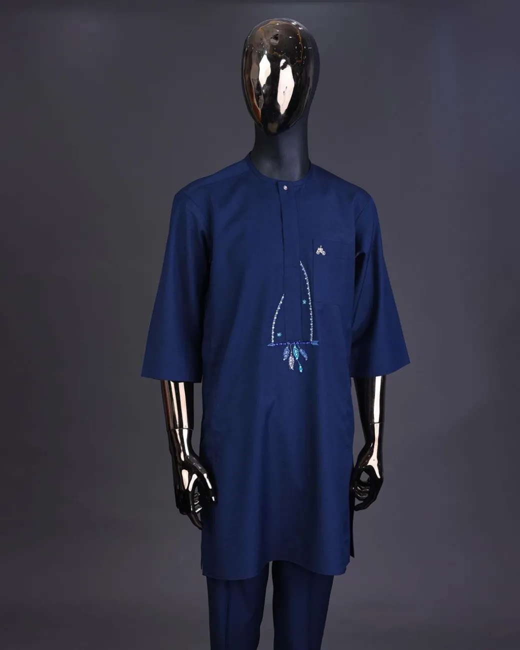 A Navy blue, front flap connected floral on arrow embroidery with crystal clear Swarovski button detailing kaftan