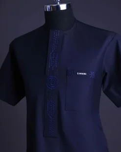 A Navy blue front flap, patch pocket with spiral embroidery detailing African senator Kaftan
