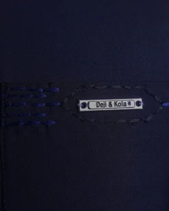 A Navy blue front flap, patch pocket with spiral embroidery detailing African senator Kaftan