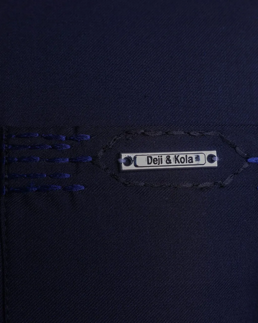 A Navy blue front flap, patch pocket with spiral embroidery detailing African senator Kaftan