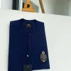 A Navy blue front flap with an Indian hand embroidery patch details African traditional senator kaftan native