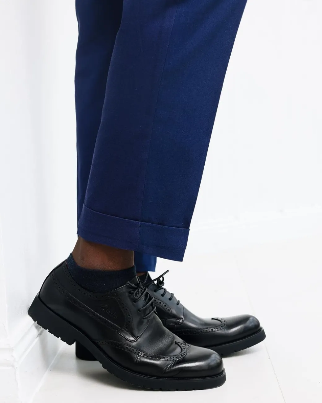 A Navy blue, Gurkha pant with double pleats trouser.