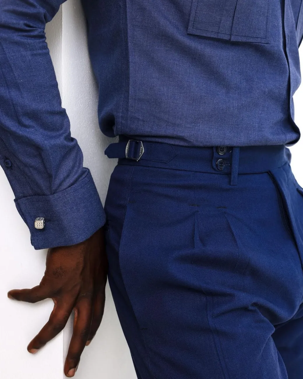 A Navy blue, Gurkha pant with double pleats trouser.