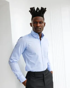 A Navy blue, herringbone high and slant collar business shirt.