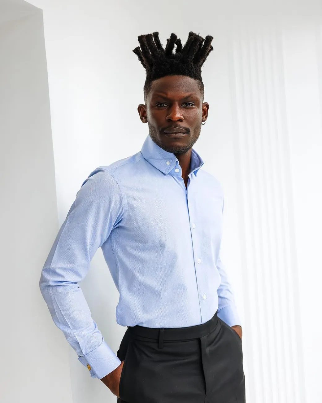 A Navy blue, herringbone high and slant collar business shirt.