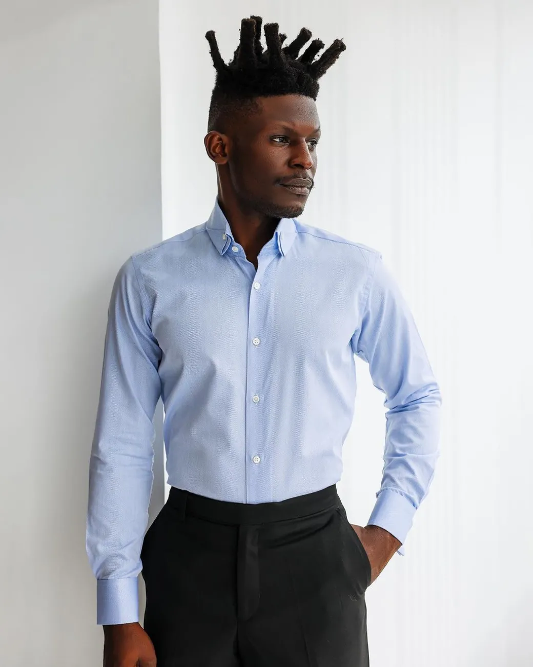 A Navy blue, herringbone high and slant collar business shirt.
