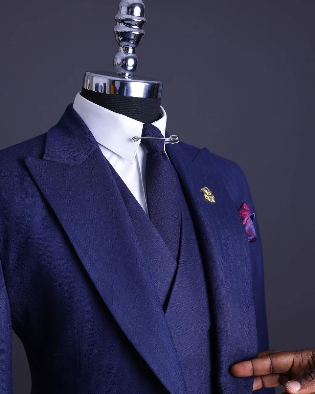 A Navy Blue, Herringbone Nobility Super “140s” “Board Room” Peak Lapel Suit