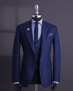A Navy blue, ivory pencil stripe, jorgecarli, peak lapel suit