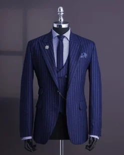 A Navy blue, ivory pencil stripe, jorgecarli, peak lapel suit
