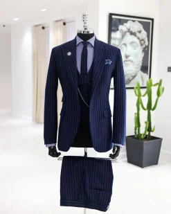 A Navy blue, ivory pencil stripe, jorgecarli, peak lapel suit