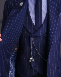 A Navy blue, ivory pencil stripe, jorgecarli, peak lapel suit