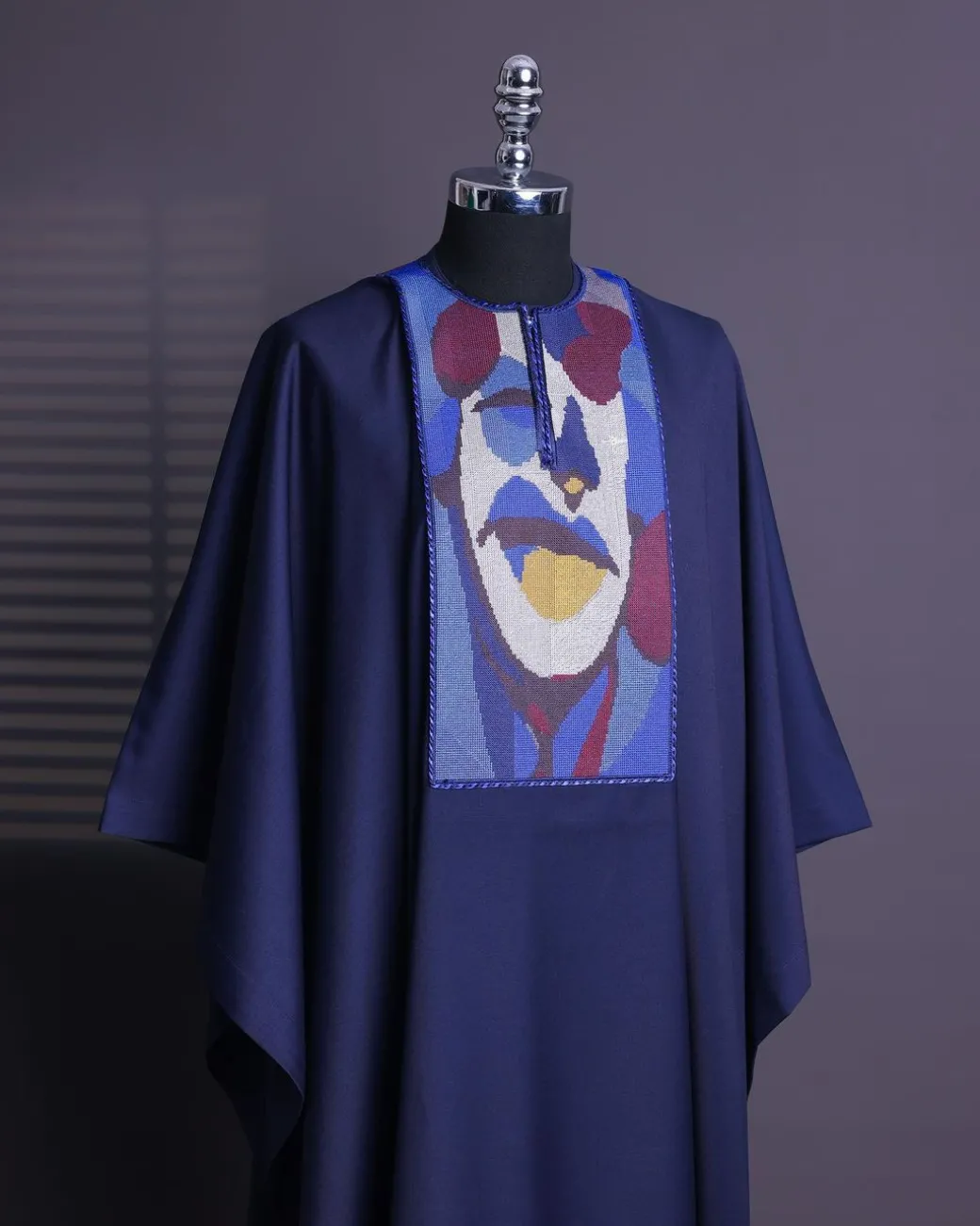 A Navy blue, “Joker” embroidery details agbada