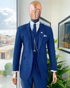 A navy blue Jorgecarli Super 140’s “Board Room” notch lapel suit