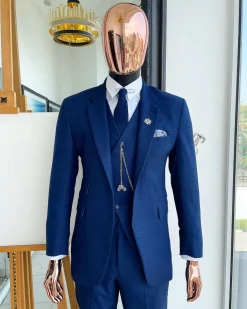 A navy blue Jorgecarli Super 140’s “Board Room” notch lapel suit