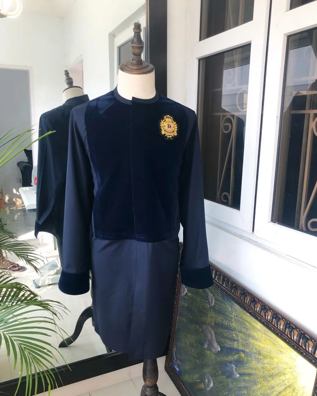A Navy Blue Kaftan, wire bullion badge and velvet detailing and sokoto