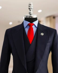 A Navy Blue, Knitted, Peak Lapel, Nobility, Invisible Stripe Suit.